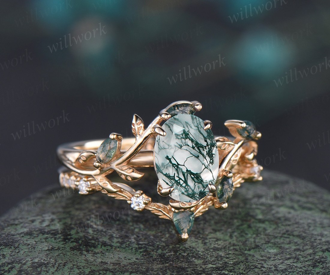 Designing a custom oval moss agate ring in solid gold with nature-inspired band