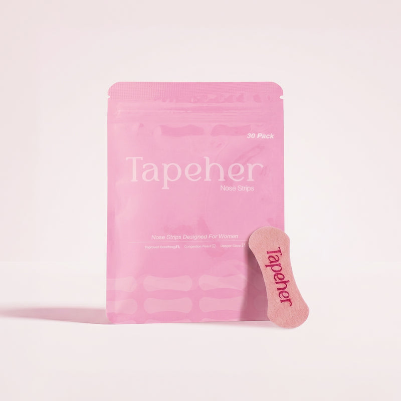 Tapeher mouth tape lifestyle image -- woman sleeping with tape applied