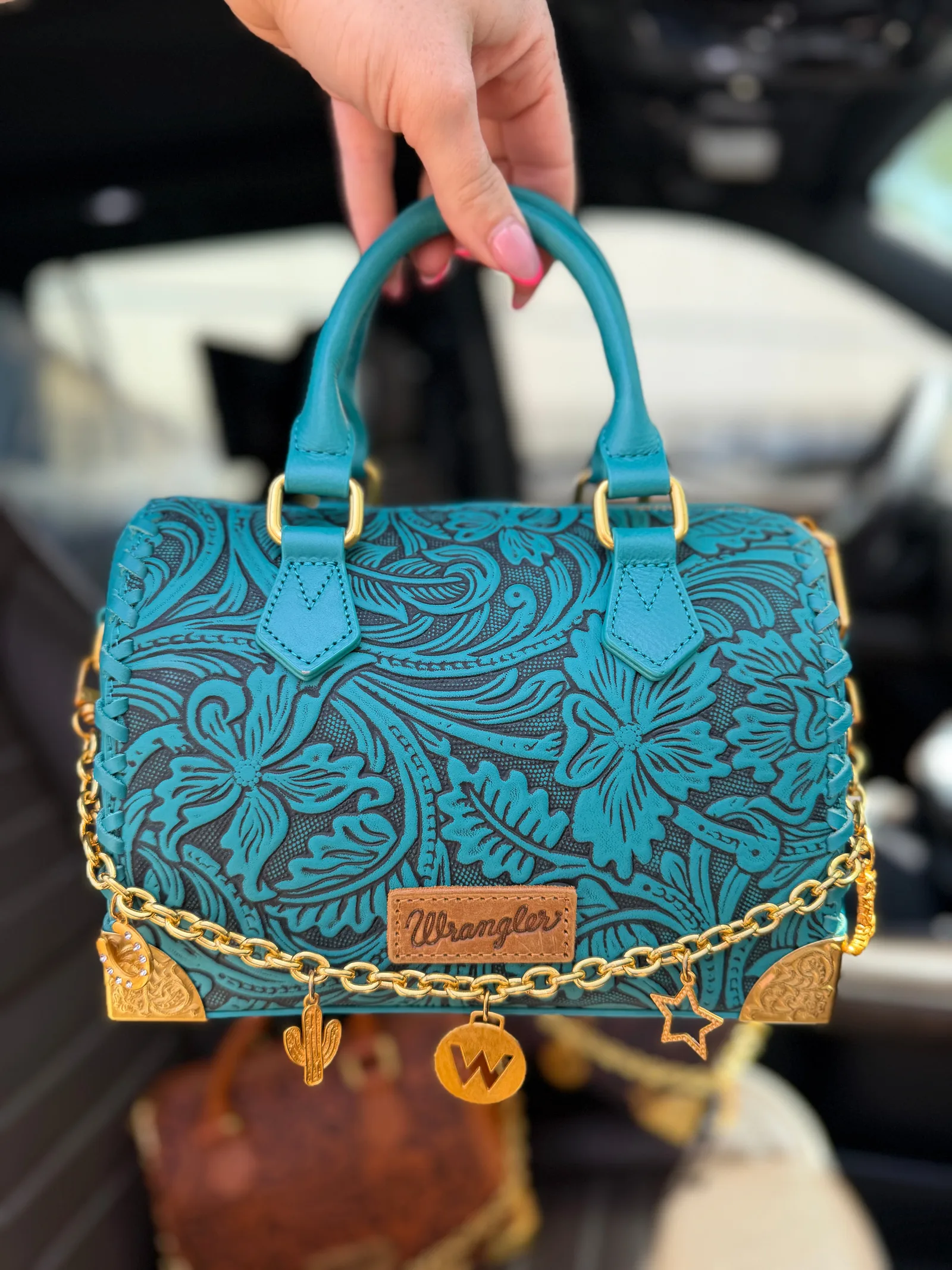 Dani Morgans Boutique Wrangler leather handbag and accessories display
