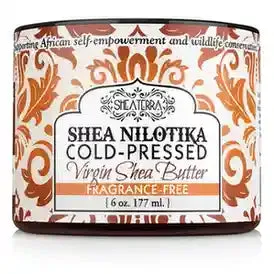 Shea Terra Organics Shea Nilotika cold-pressed virgin shea butter jar on a neutral background