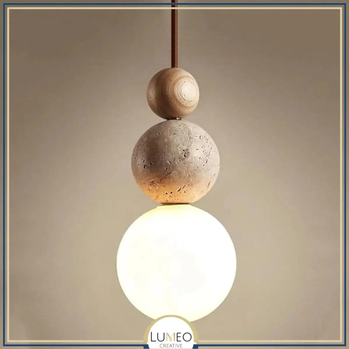 Lumeo creative pendant light in natural stone hanging above a dining table