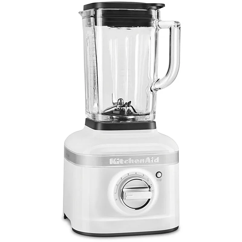 KitchenAid Artisan white stand mixer with tilt-head raised on a kitchen countertop