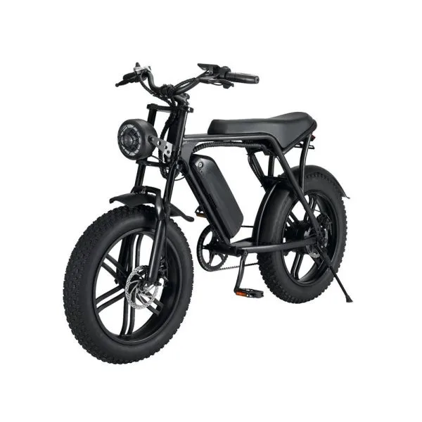 OUXI electric bikes V8 model riding on mountain trail terrain demonstrating fat-tire traction