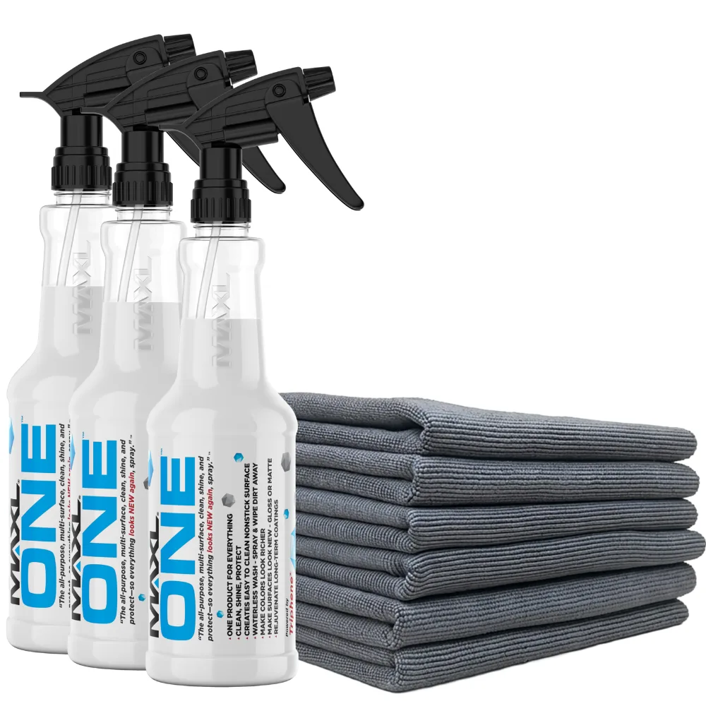 MAXL ONE with Triphene gallon kit packaging on a workbench