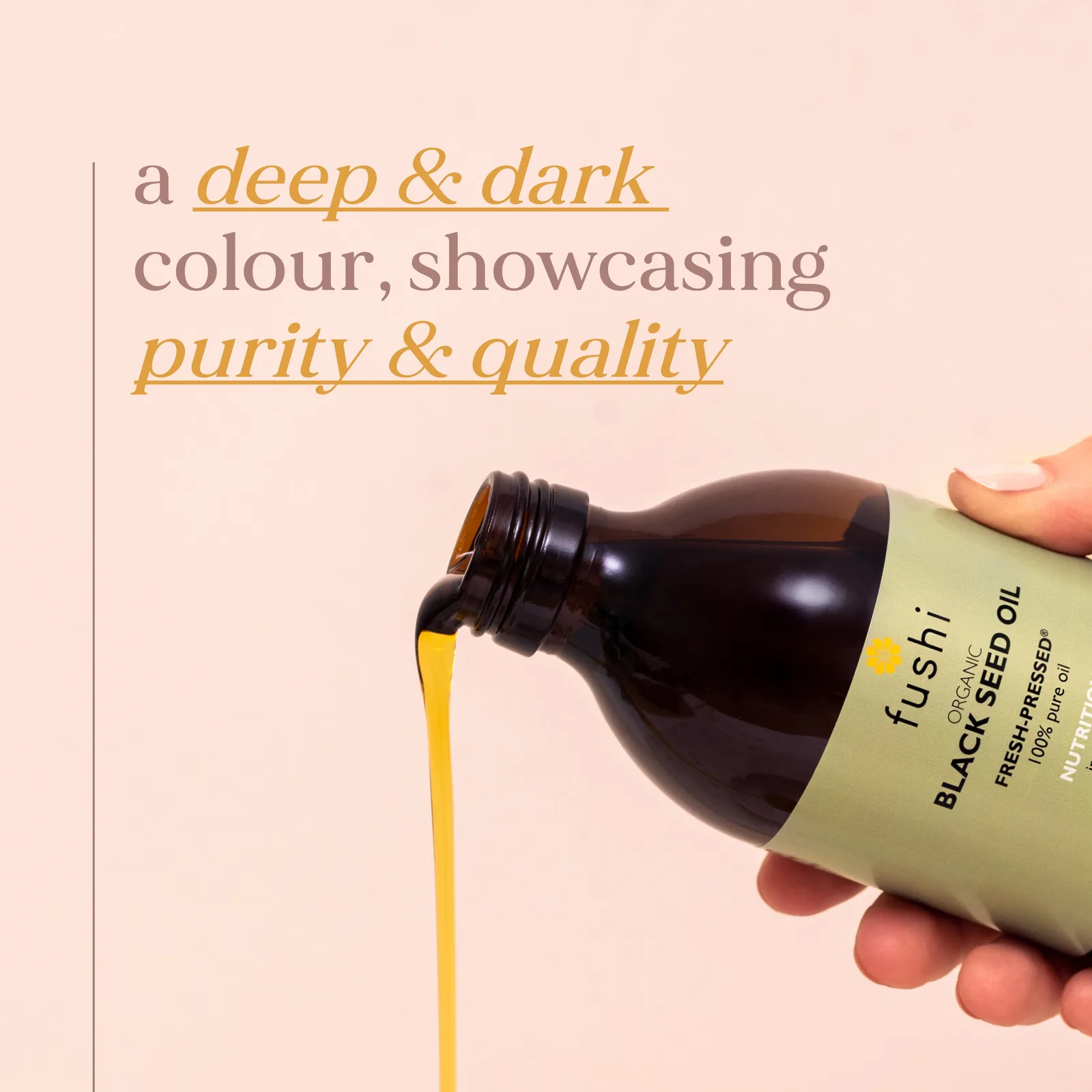 Fushi Organic Black Seed Oil being poured from the 250ml bottle, showing the deep dark colour of the oil