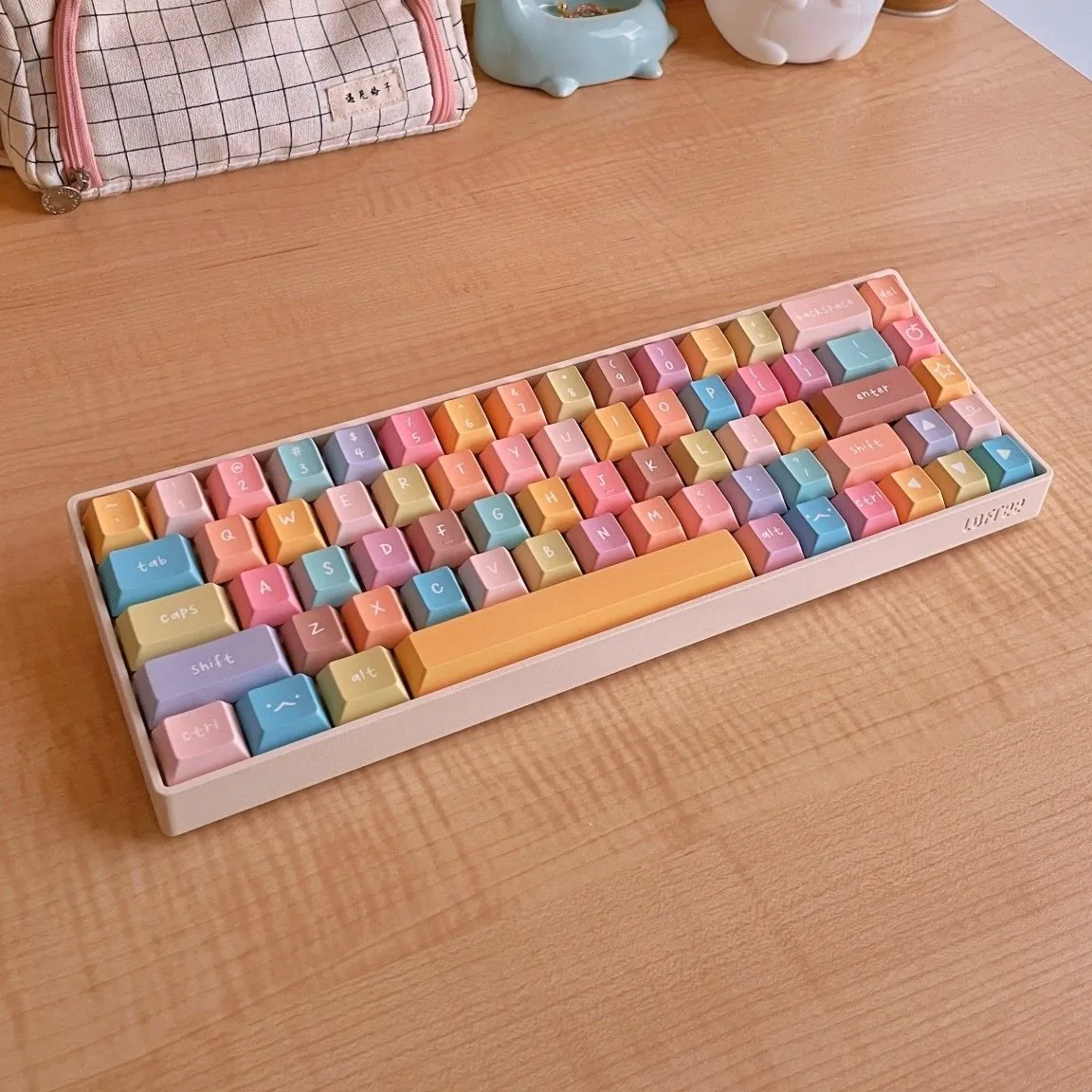 Goblintechkeys corporate swag: logo-branded keycap and fidget keychain set