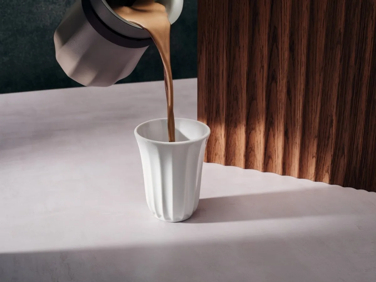 Drinking chocolate pouring from the Hotel Chocolat Velvetiser into a cup