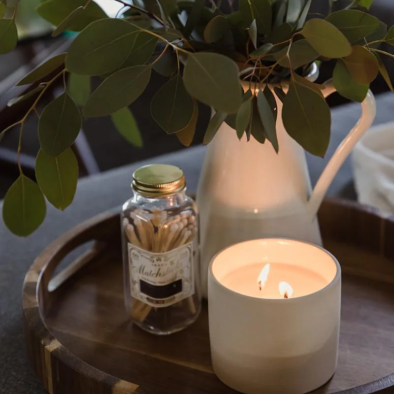 Thistle Farms Love Heals Collection candles arranged together showing seven scent options