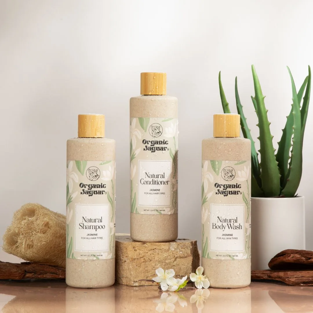 Organic Jaguar Natural Conditioner bottle held in hand