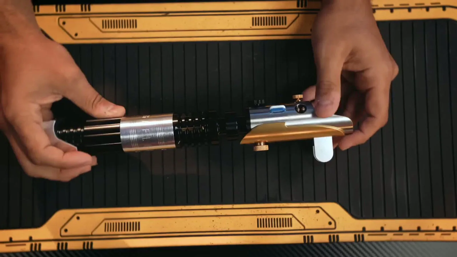 Best neopixel lightsabers for dueling lined up showing hilt and blade construction